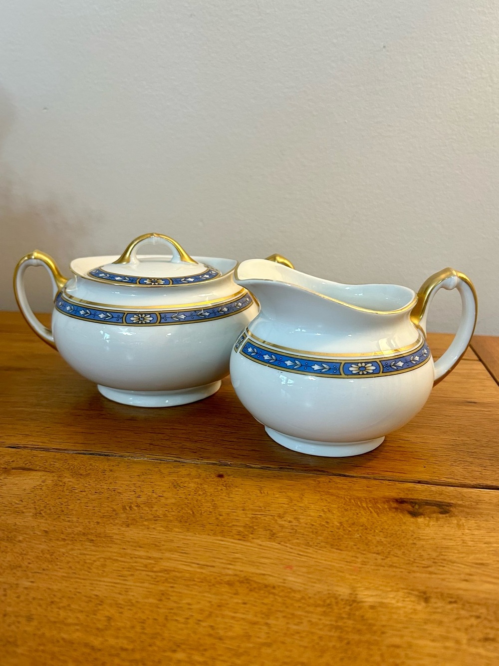 Vintage White Porcelain Sugar Bowl and Creamer Set with Blue